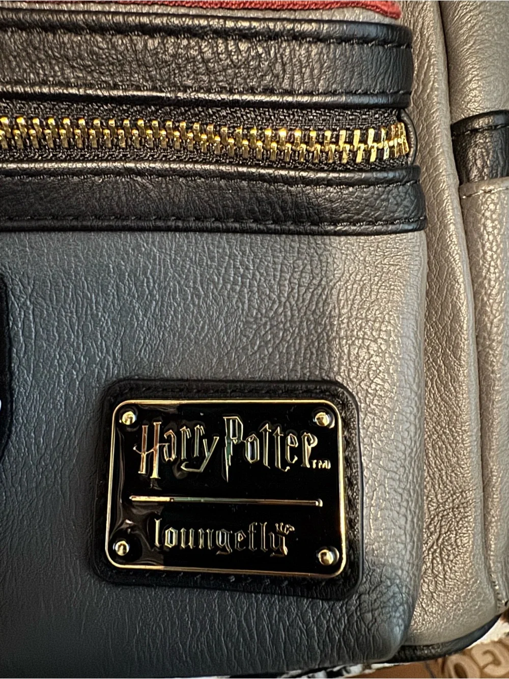 Loungefly Gray Gryffindor Mini Backpack with Red & Gold Stripe